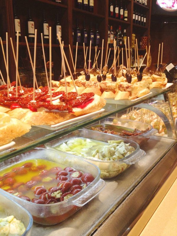 An example of the tapas displayed atop a tapas bar cabinet. Pick what you want, and pay the relative amount after you’re your discarded toothpicks left on your plate are counted.