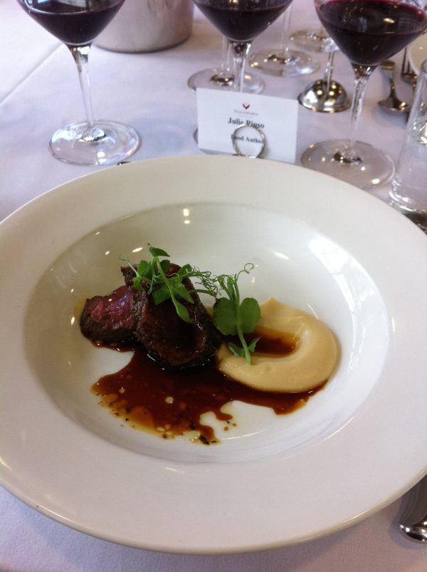 Peppered crusted venison with parsnip truffle puree and pinot jus