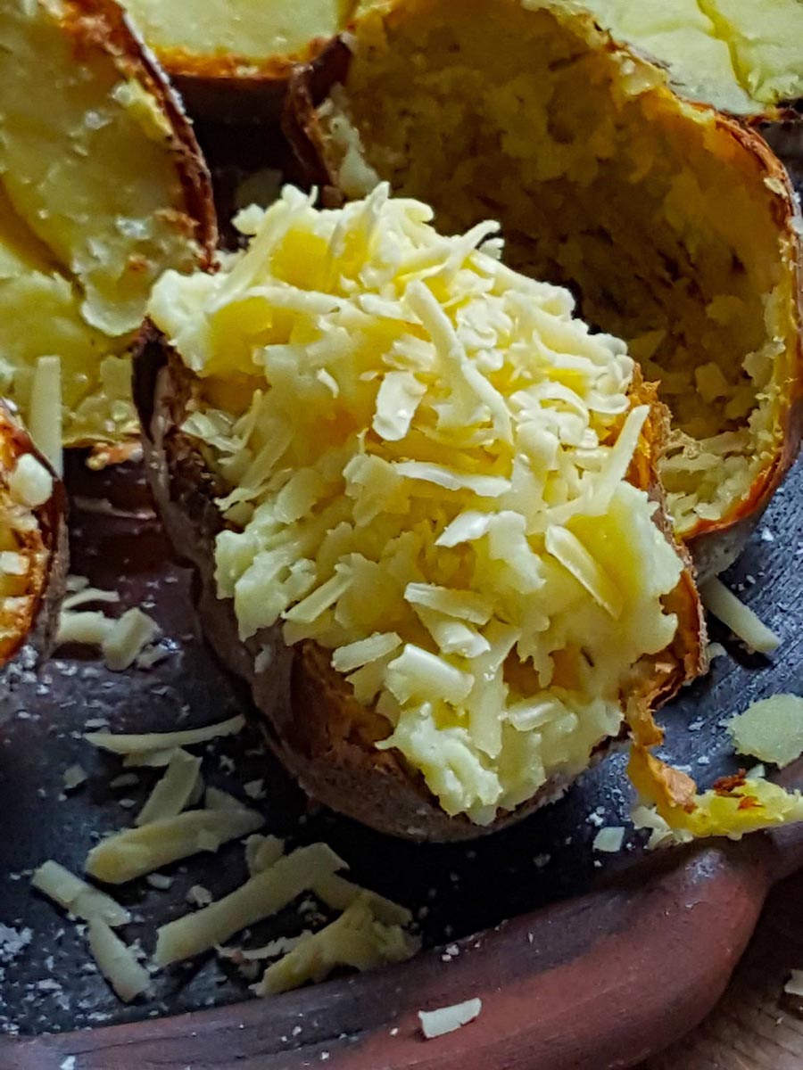 Cheesy0-topped crunchy-skinned jacket potatoes