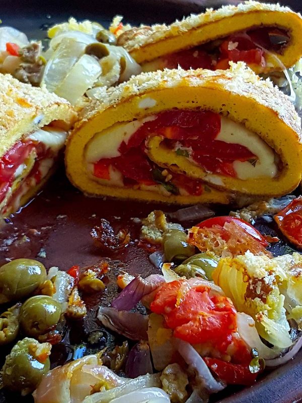 |The base for a rolled frittata|Layering Rotolo di Frittata|Layering Rotolo di Frittata|Rolling Rotolo di Frittata|Sprinkle rotolo d & crumbsi frittata with parmesan
